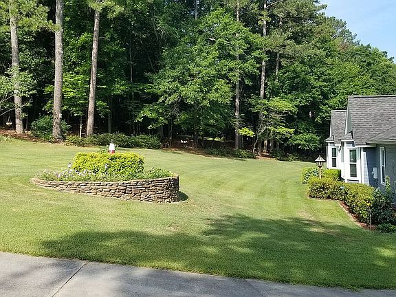 Front Yard w/wooded Nature Trail
