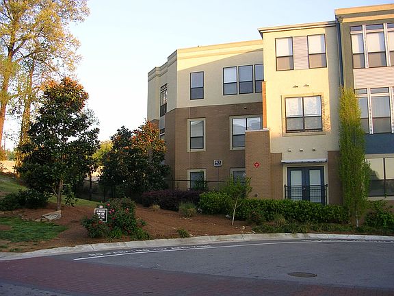 The property is lushly landscaped, offers courtyards and greenspace.