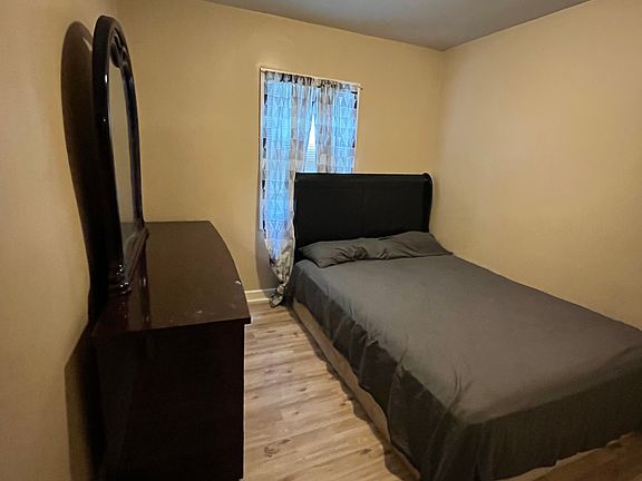 Furnished bedroom on top floor