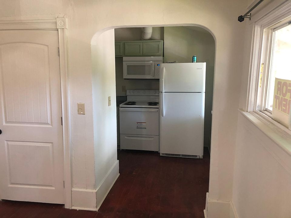Separate kitchen space with full size appliances.