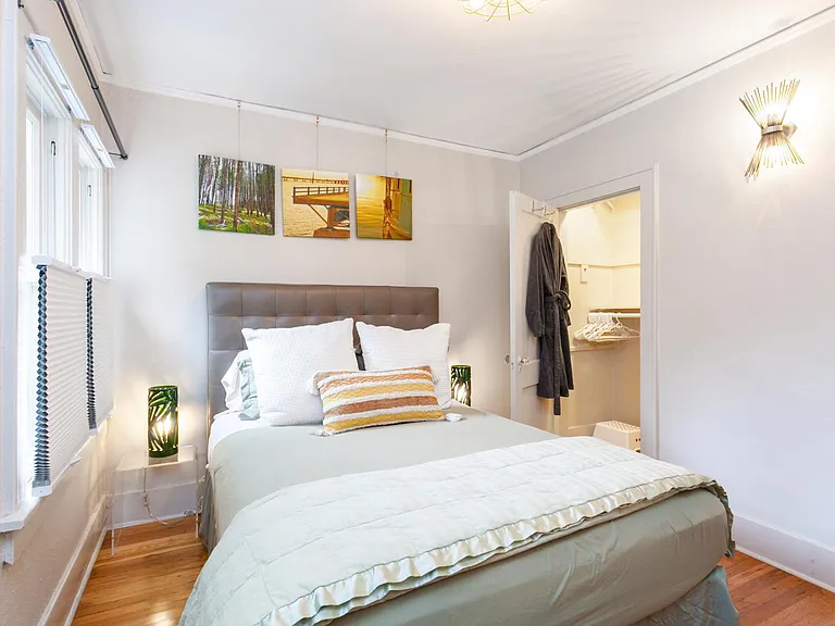 Second bedroom (main floor) with Queen Bed and large closet.