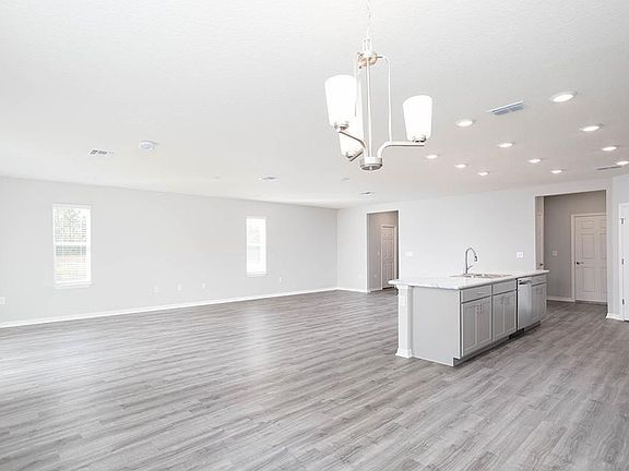 Enjoy a spacious and open living area - Westbrooke II home plan by Highland Homes