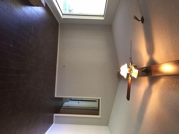 Vaulted LR with wood look tile flloors