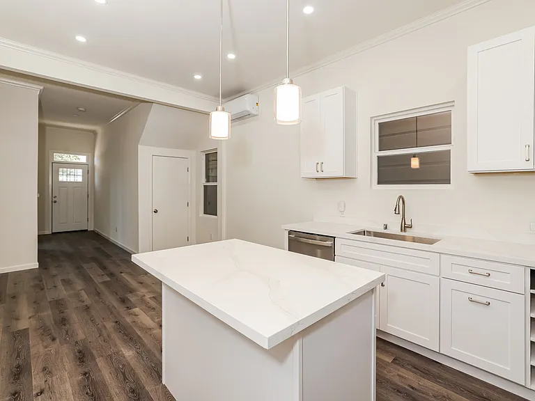 Bright kitchen with island seating and open layout