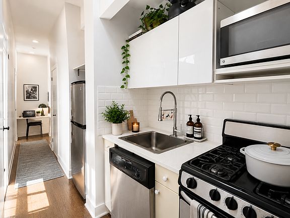 5th image of 237 E 10th St APT 1B