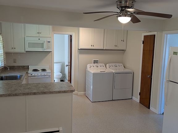 Large eat-in Kitchen with Refrig/Freezer, Dishwasher, Stove/Oven, Built-in Microwave. Private regular sized washer and drying in unit. Huge amount of cabinet and closet storage space throughout