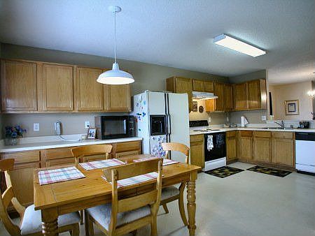 large kitchen with plenty of room for the whole family, plus a walk-in pantry