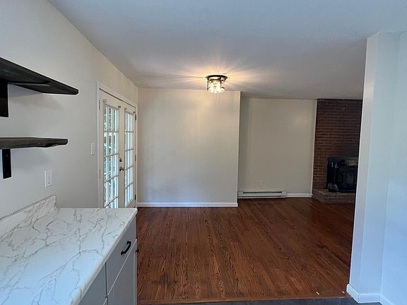 Dining Room opens to the living room and double doors to back deck