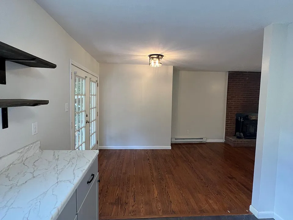 Dining Room opens to the living room and double doors to back deck