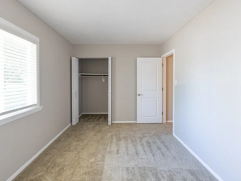 Second Bedroom in the Two Bedroom Townhome at Woodbridge Bloomington