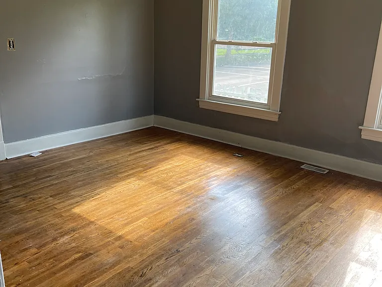 Living Room from Dining Area showing Hardwood Floors