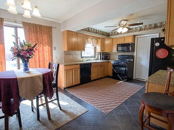 The open Kitchen and Eating area provides plenty of room for entertaining and preparing meals.
