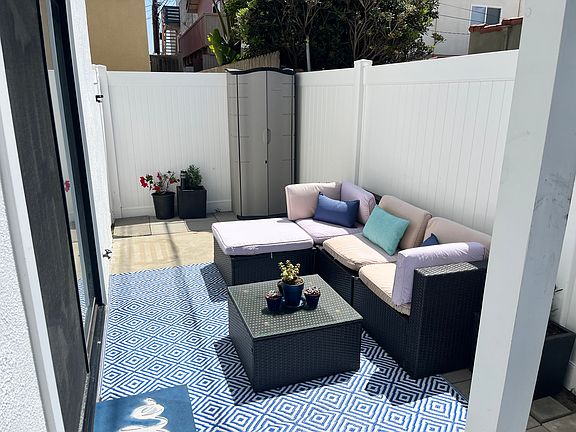 Outdoor seating area from Bedroom sliding glass doors