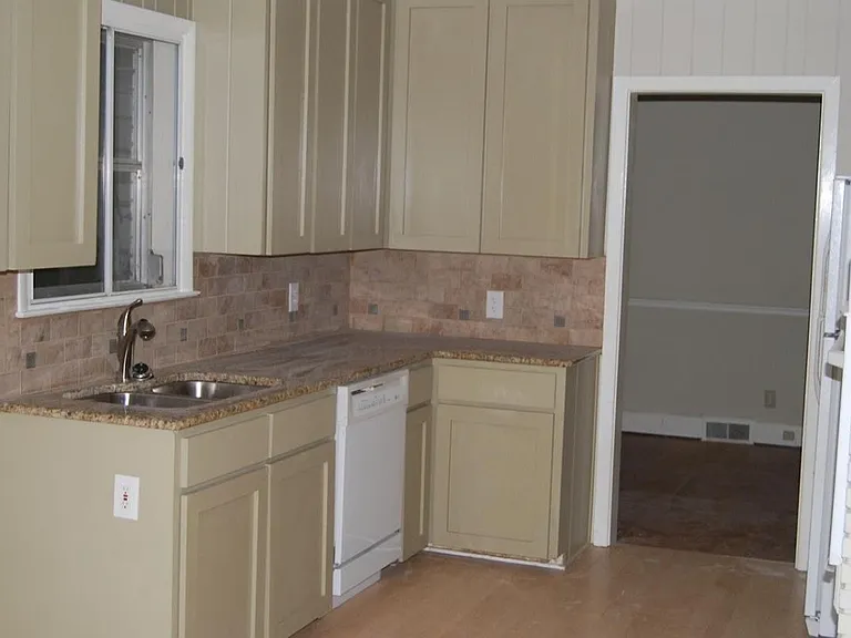 left side of kitchen; dining room off the kitchen
