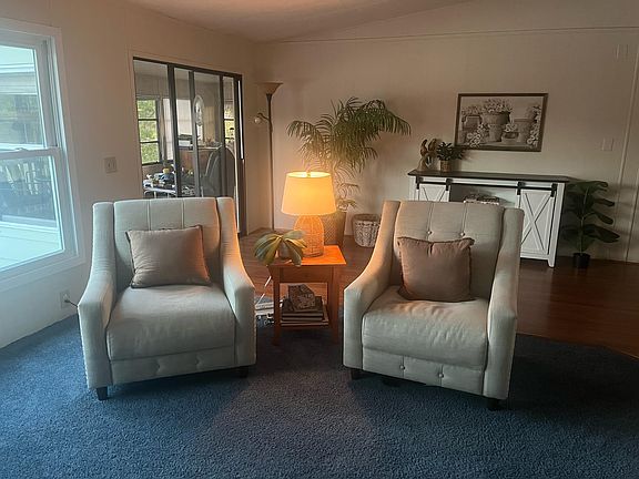 Living room, sun room in back.