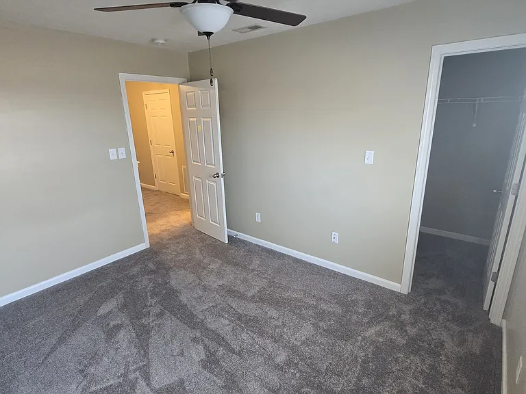 Bedroom 2 with modest walk-in closet