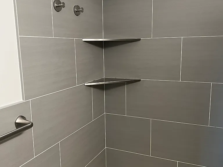 Bathroom Showing Shower Wall, Shelves Built in