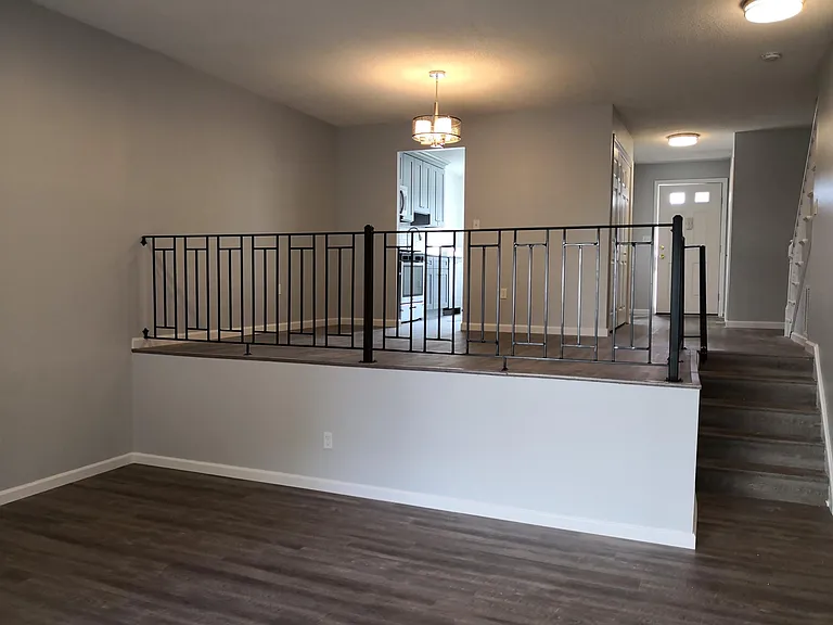 Large living room with new flooring and LED lighting