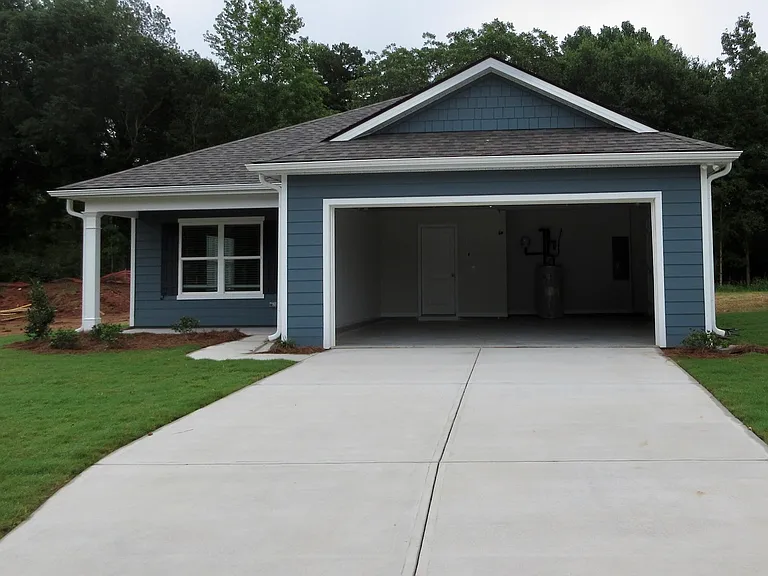 Front view w/open garage