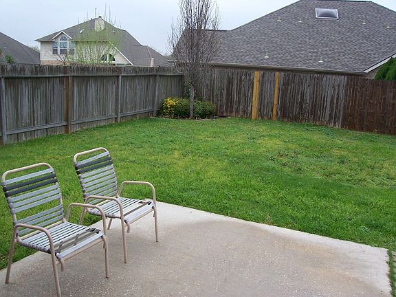 Large backyard with patio