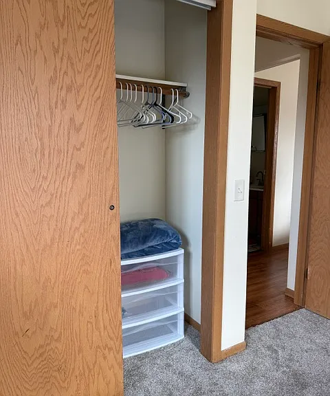 Bedroom #1 Closet, view to hallway/bathroom