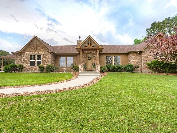 This gorgeous home boasts 2,610 square feet of quality living space that includes three spacious bedrooms, two full and one half baths, cozy den, and a large gourmet island kitchen that opens to the spacious living and dining areas.