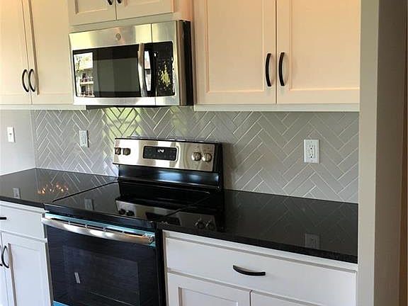 5th image of 20808 E 50th Terrace Ct