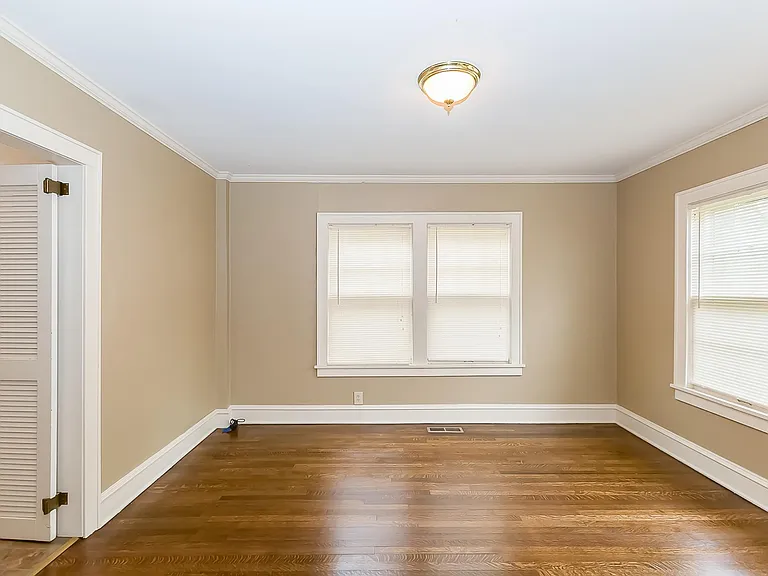 The dining room has a closet for dishes or other items. The Hardwood Floors have been refinished throughout the house.