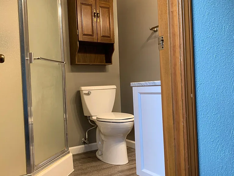 Master bathroom with corner shower
