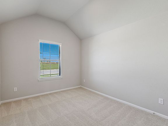 Bedroom in the Diamond home plan by Trophy Signature Homes - REPRESENTATIVE PHOTO