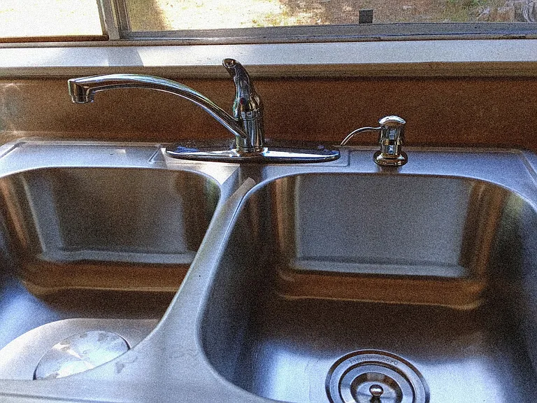 New sink and dishwasher (next photo) 1 year old .