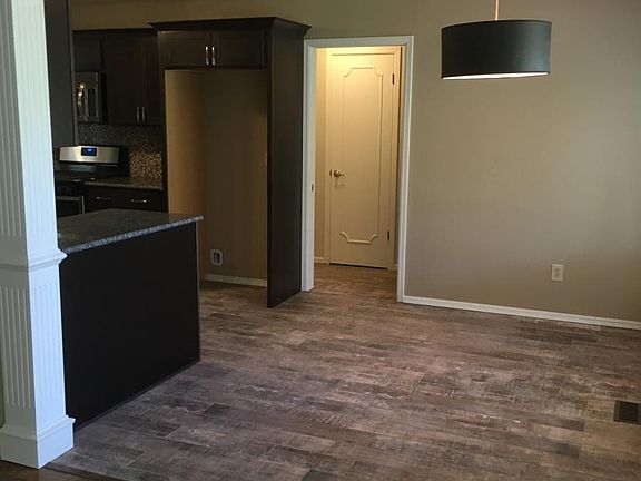 NEW TILE FLOORS IN KITCHEN AND DINING