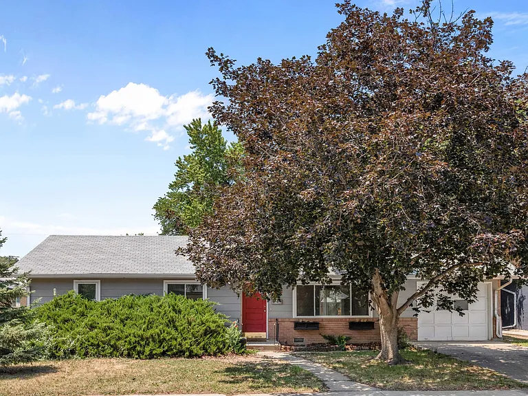 Charming from the start, this single-story home is shaded by mature trees and includes an attached one-car garage.
