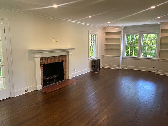 Living room - freshly painted, new lighting, floors recently refinished
