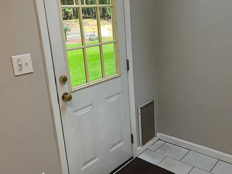 Dog Door in Mudroom