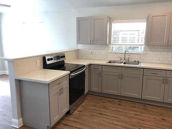 All new cabinetry, quarts counter-tops and new appliances.