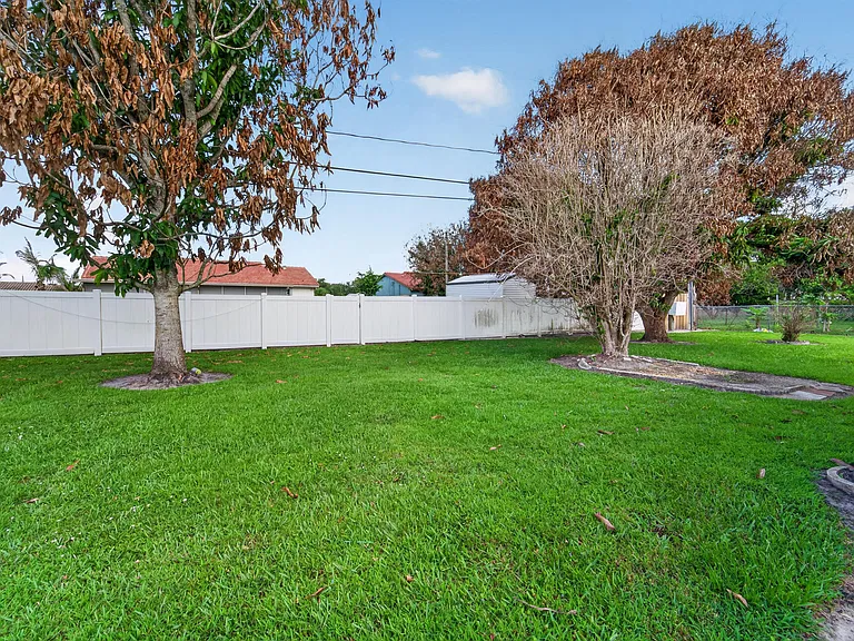 6956 NW Jorgensen Rd — Photo 21