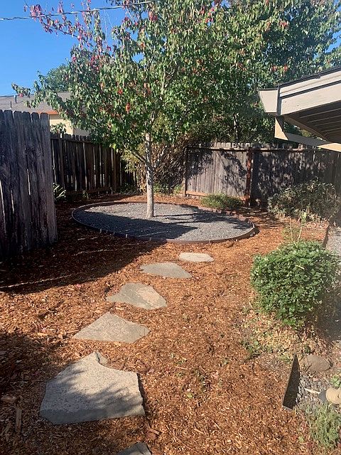 Unit 3 Backyard - Maintained by Landscaper