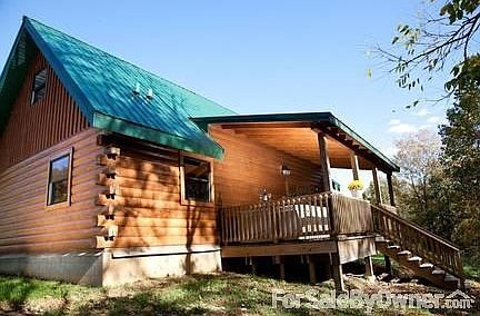 Large Log Cabin Covered Deck - Hot Tub!
						:
						Log cabin covered deck with hot tub leads down to private 2-3 acre stocked pond.
