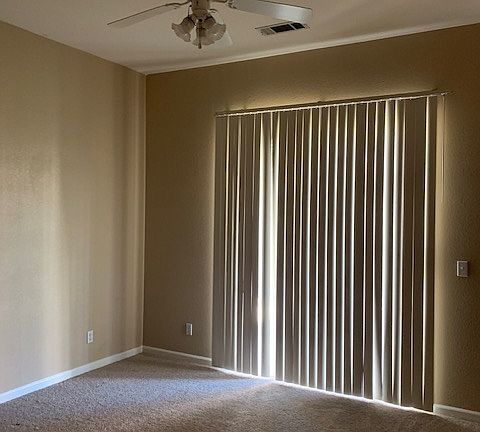 Master Bedroom with sliding door to the backyard