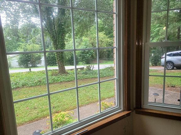 Looking from living room out the bay window. The street is Mattison St.