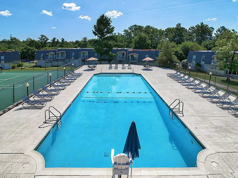 Swimming Pool and Sundeck and nearby Tennis Court