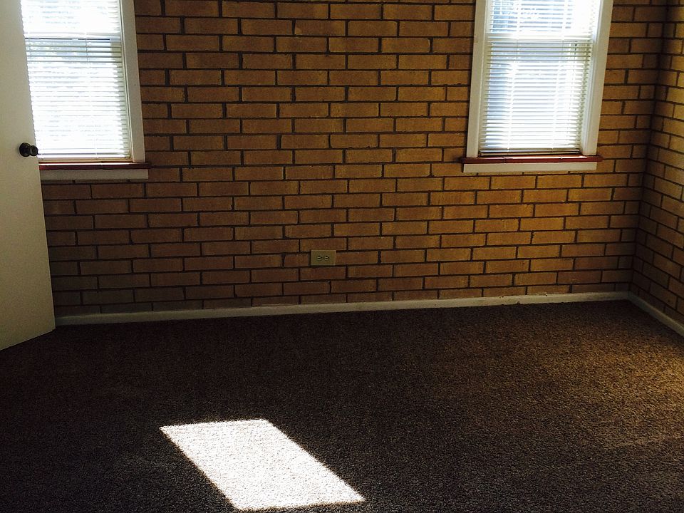 Beautiful Brick Wall inside bedroom