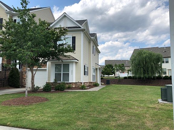 Front view showing large lawn surrounding your unit