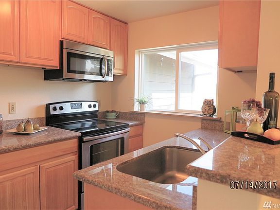 5th image of 12424 109th Ct NE APT D301