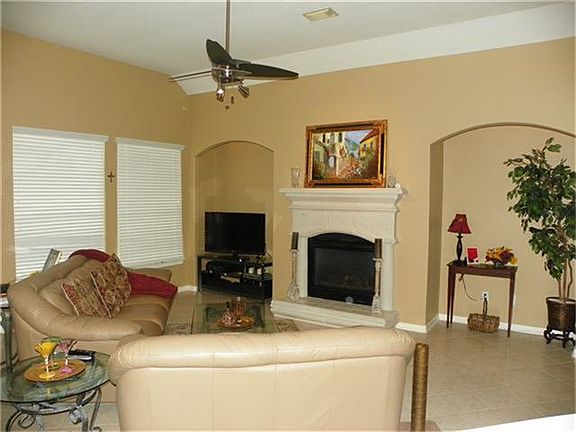 The family room is huge and has seamless ceramic tile flowing throughout this area, the kitchen, entry and breakfast room.