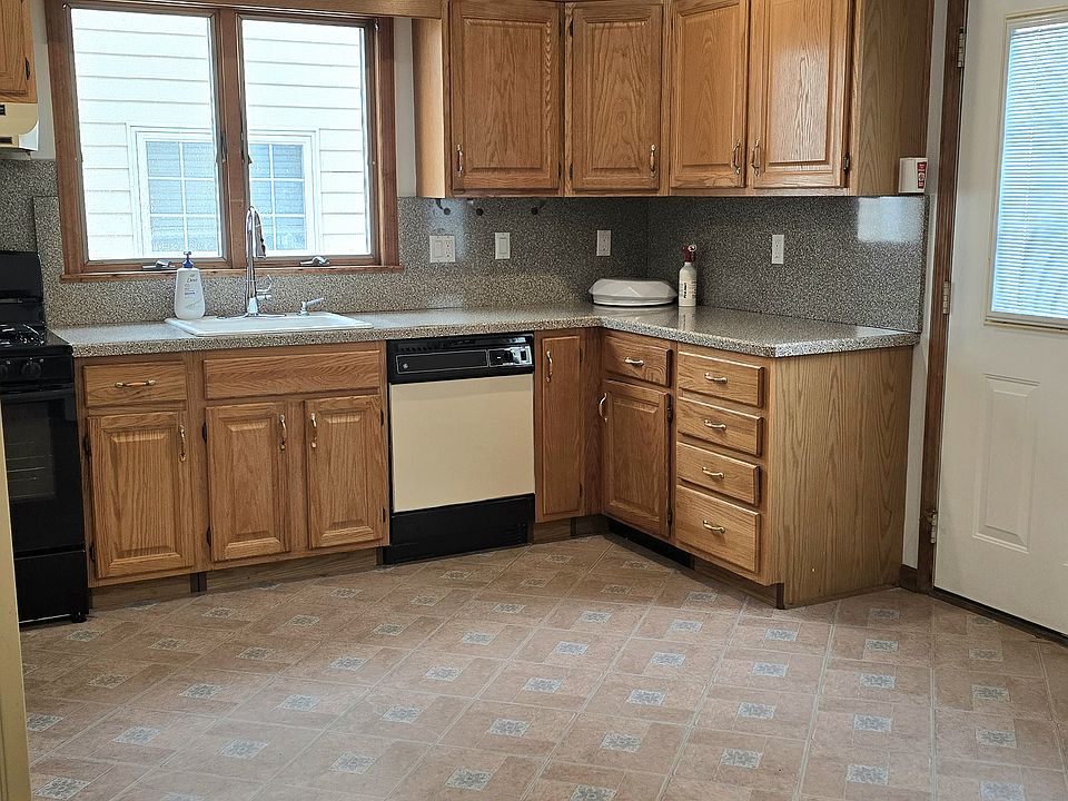 Kitchen: Dishwasher, New Refrigerator and Lighting 
Kitchen Entrance