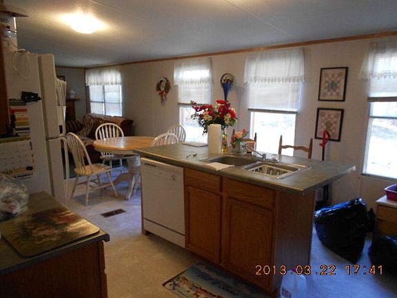 Notice all of the windows in the kitchen