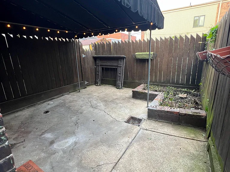 Backyard: private outdoor covered patio