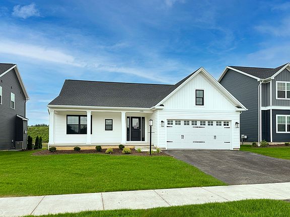 Aspen F exterior - single story ranch home with full front porch and two car garage